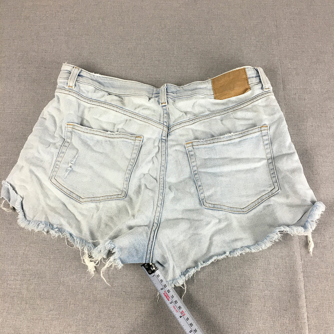 H&M Womens Denim Shorts Size 12 Light Wash Blue Ripped Raw Hem Pockets