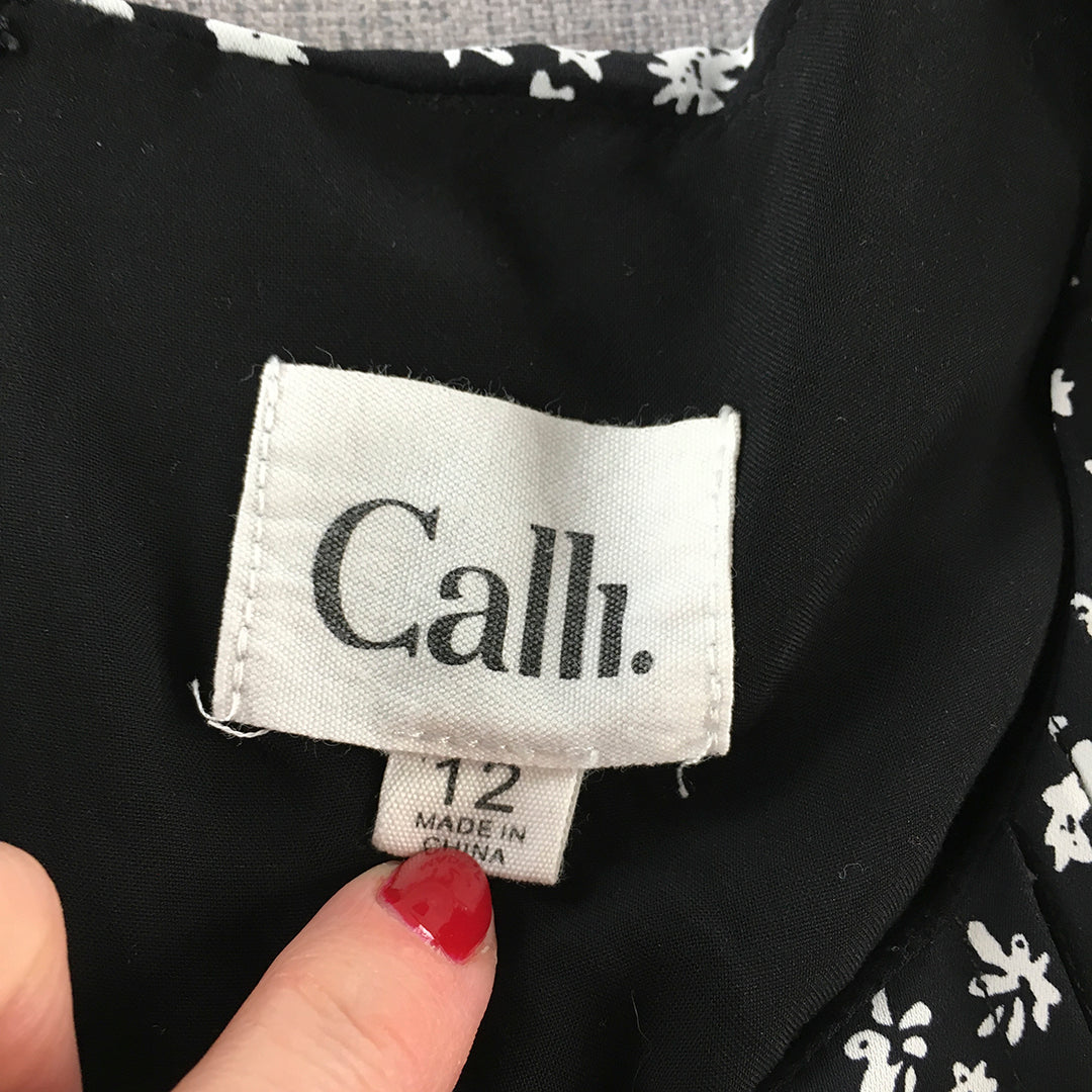 Calli Womens Mini Dress Size 12 Black White Floral A-Line Short Sleeve