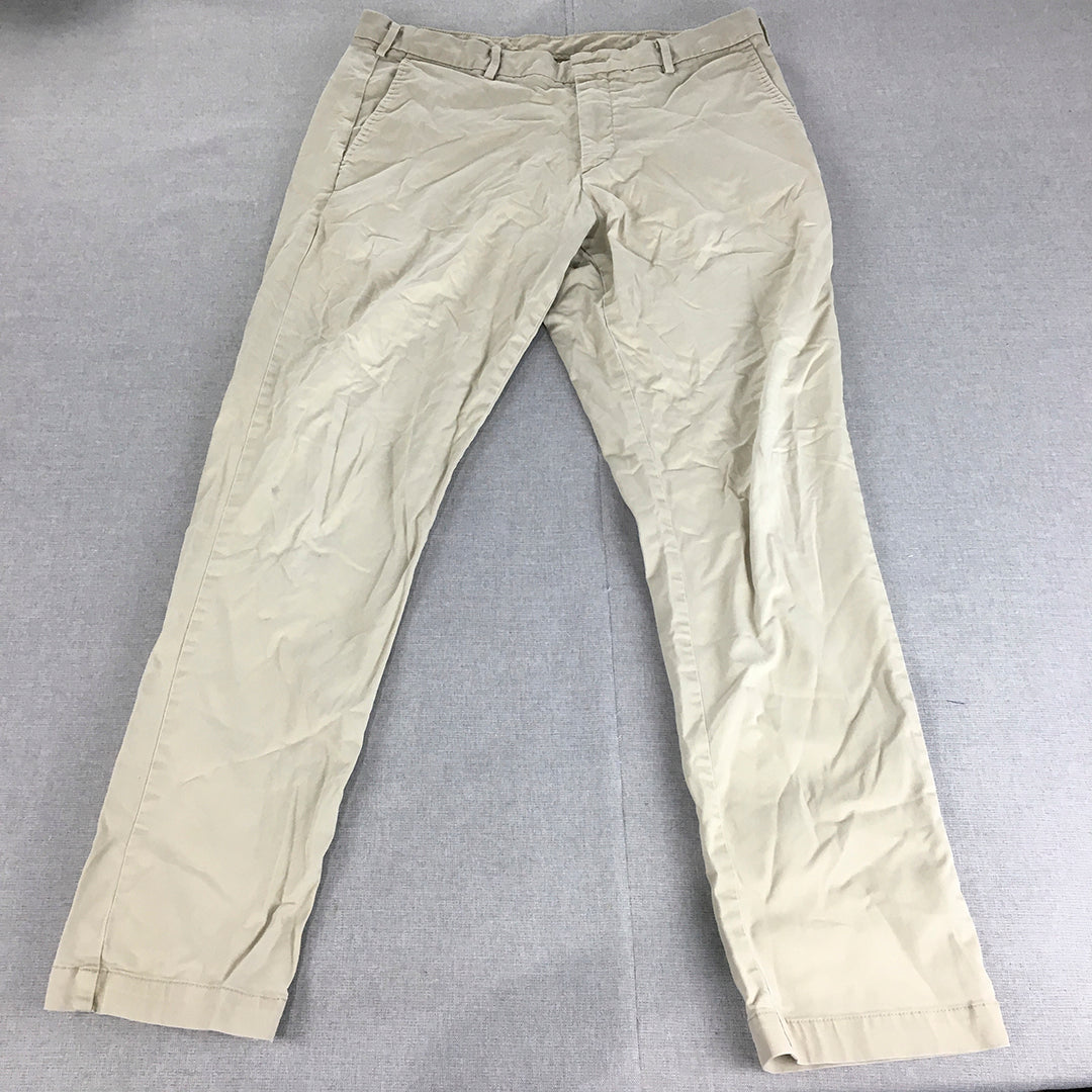 Uniqlo Mens Chino Pants Size 35 Cream Beige Elastic Waist Slim Straight Pockets