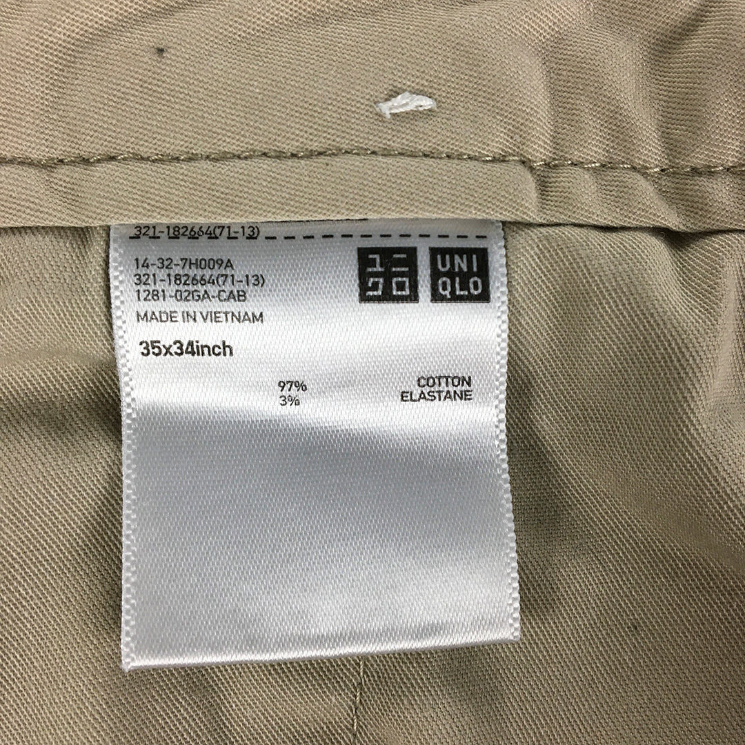 Uniqlo Mens Chino Pants Size 35 Cream Beige Elastic Waist Slim Straight Pockets