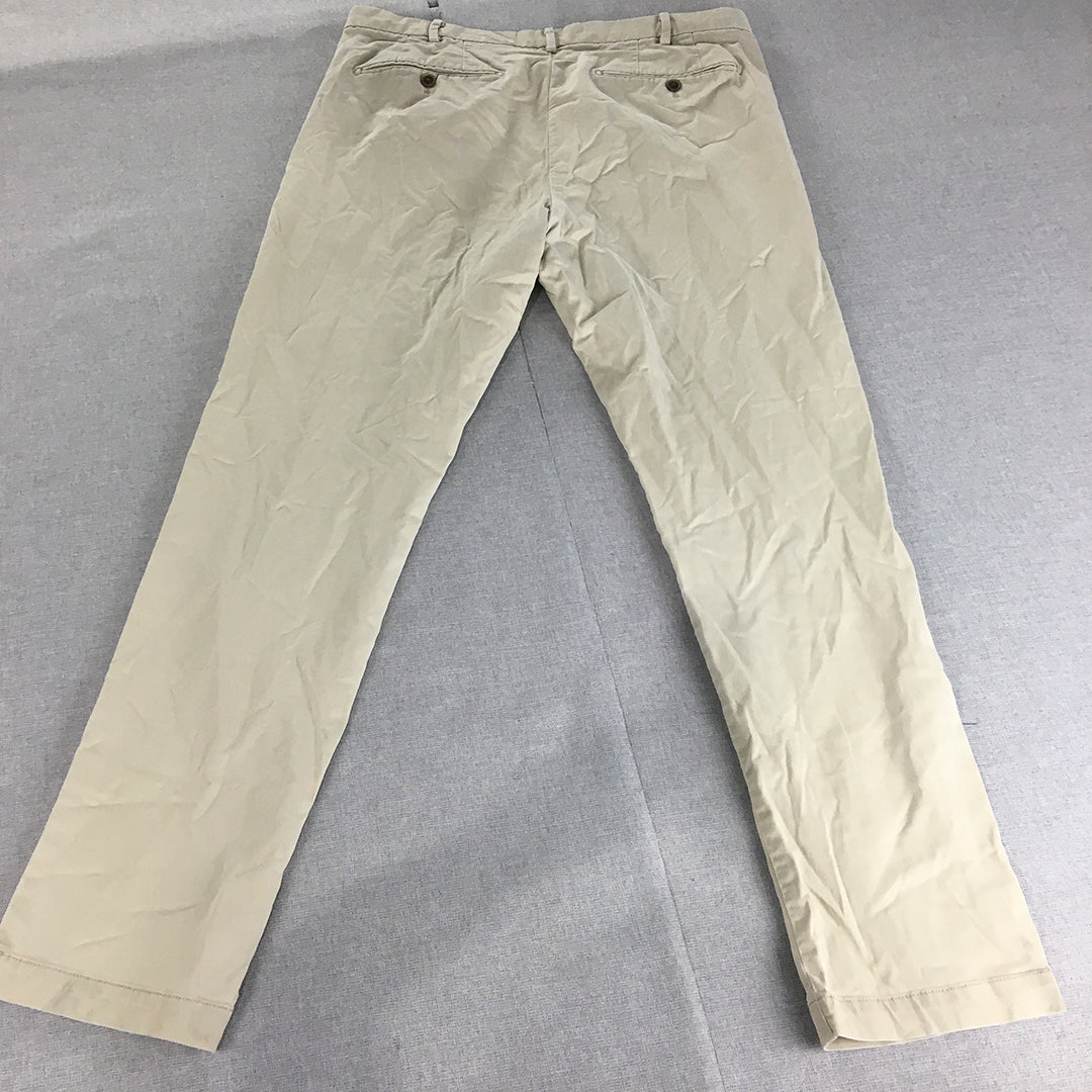 Uniqlo Mens Chino Pants Size 35 Cream Beige Elastic Waist Slim Straight Pockets